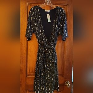 Wrap dress by Gilli, NY sold by Stitch Fix. Dress is navy and white. Size 1x...